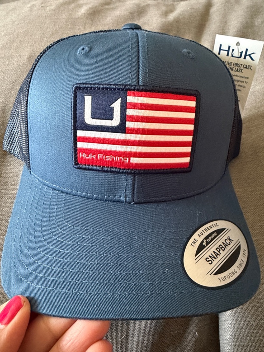 Huk Blue Trucker Hat with American Flag Patch